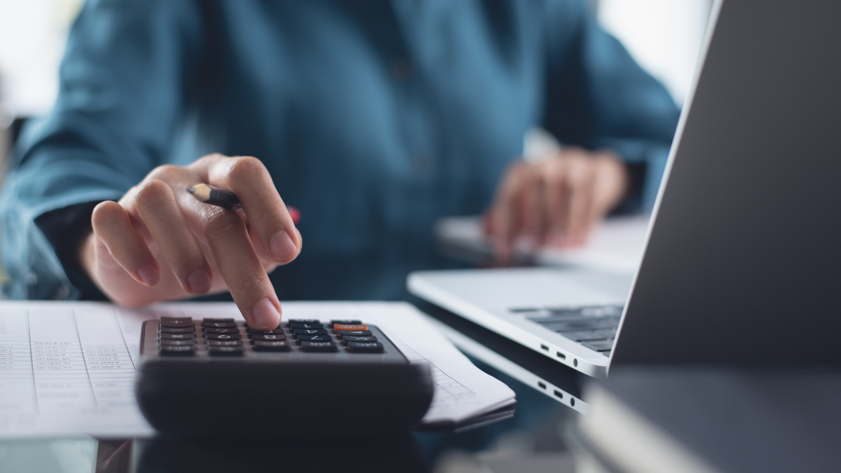 A man doing business accounting for a client to avoid crucial accounting mistakes